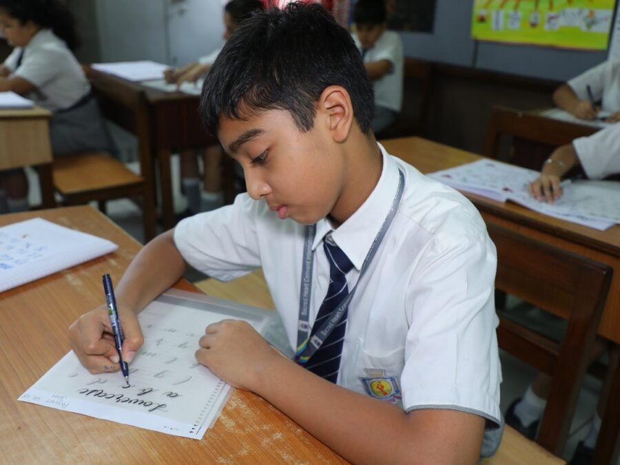 Student engaged in classroom learning at Sacred Heart Convent International School